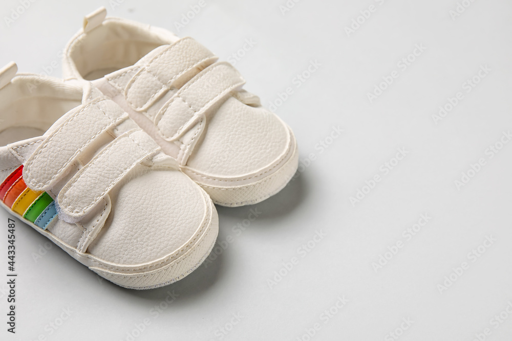 Baby shoes on light background Baby shoes on light background