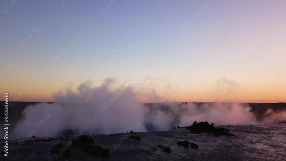 White Clouds Over The River Falls With Scenic Sunset Sky At Background. - Wide Shot White Clouds Over The River Falls With Scenic Sunset Sky At Background. - Wide Shot