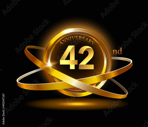 42nd anniversary with gold ring graphic elements on black background photo