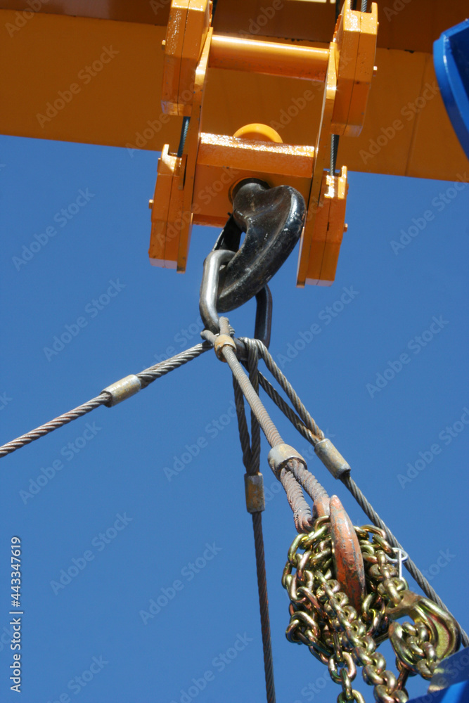 Powerful crane hook. Industrial background Powerful crane hook. Industrial background