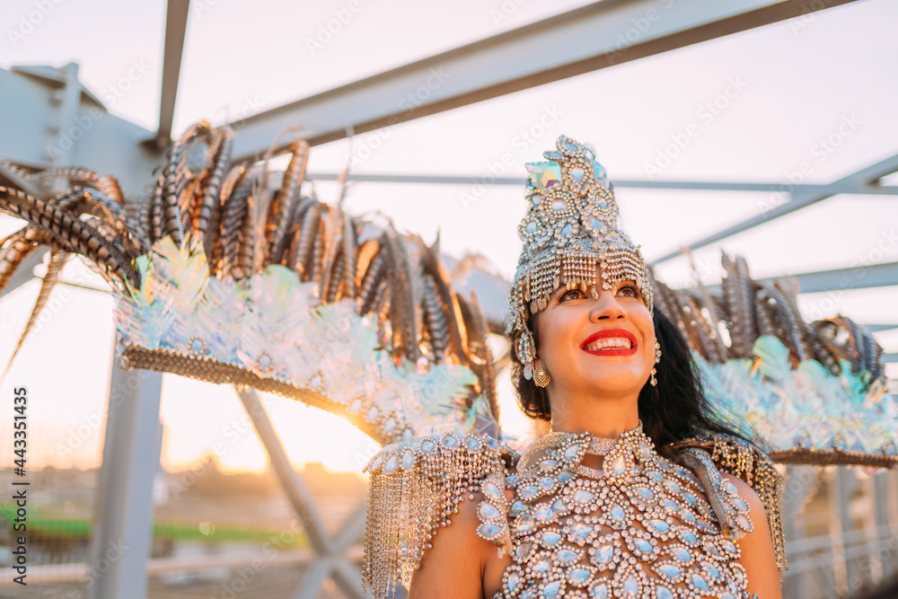 Beautiful Brazilian woman wearing colorful Carnival costume and smiling ...