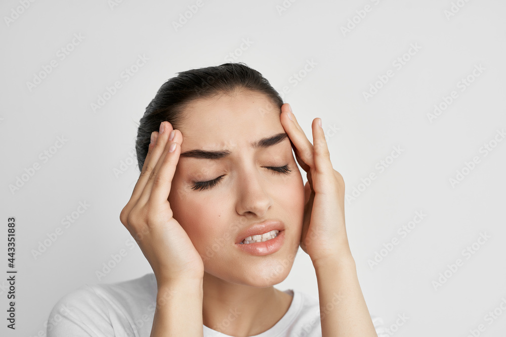 woman holding her head migraine health problems dissatisfaction woman holding her head migraine health problems dissatisfaction