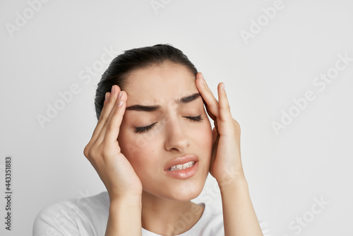 Wallpaper Mural woman holding her head migraine health problems dissatisfaction Torontodigital.ca