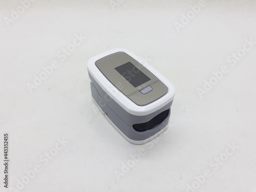 Modern Clean Design Oximeter for Blood Oxygen and Heart Rate Covid19 Disease Medical Monitoring in White Isolated Background