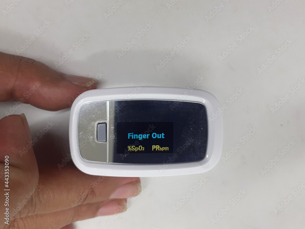Modern Clean Design Oximeter for Blood Oxygen and Heart Rate Covid19 Disease Medical Monitoring in White Isolated Background Modern Clean Design Oximeter for Blood Oxygen and Heart Rate Covid19 Disease Medical Monitoring in White Isolated Background