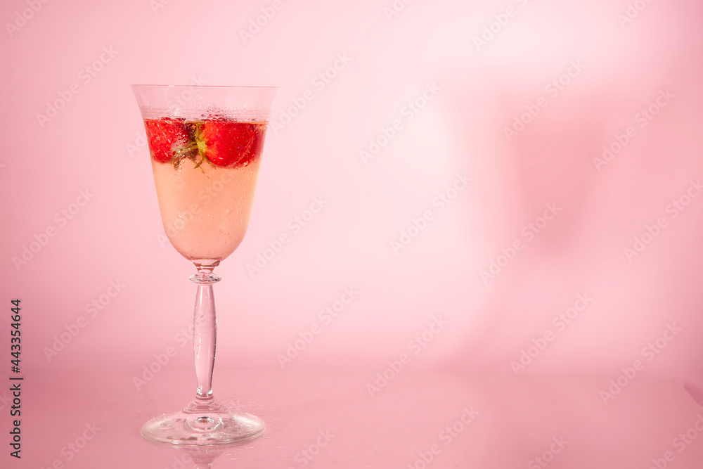 a glass of champaign and strawberries a glass of champaign and strawberries