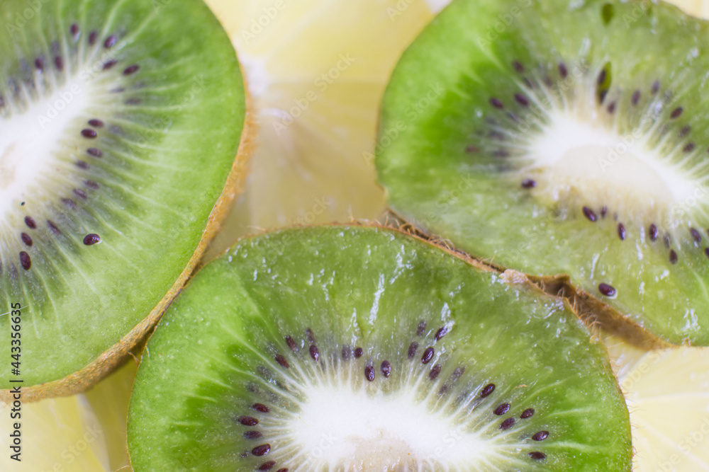 sliced slices of green kiwi and lemon. slicing berries sliced slices of green kiwi and lemon. slicing berries