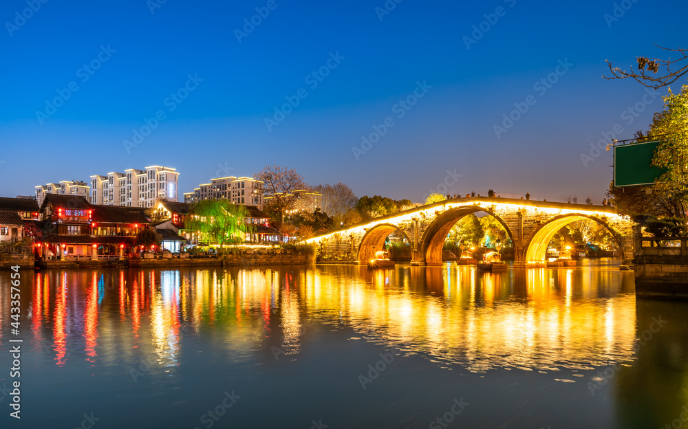 Night view of the ancient canal of Hangzhou Gongchen Bridge