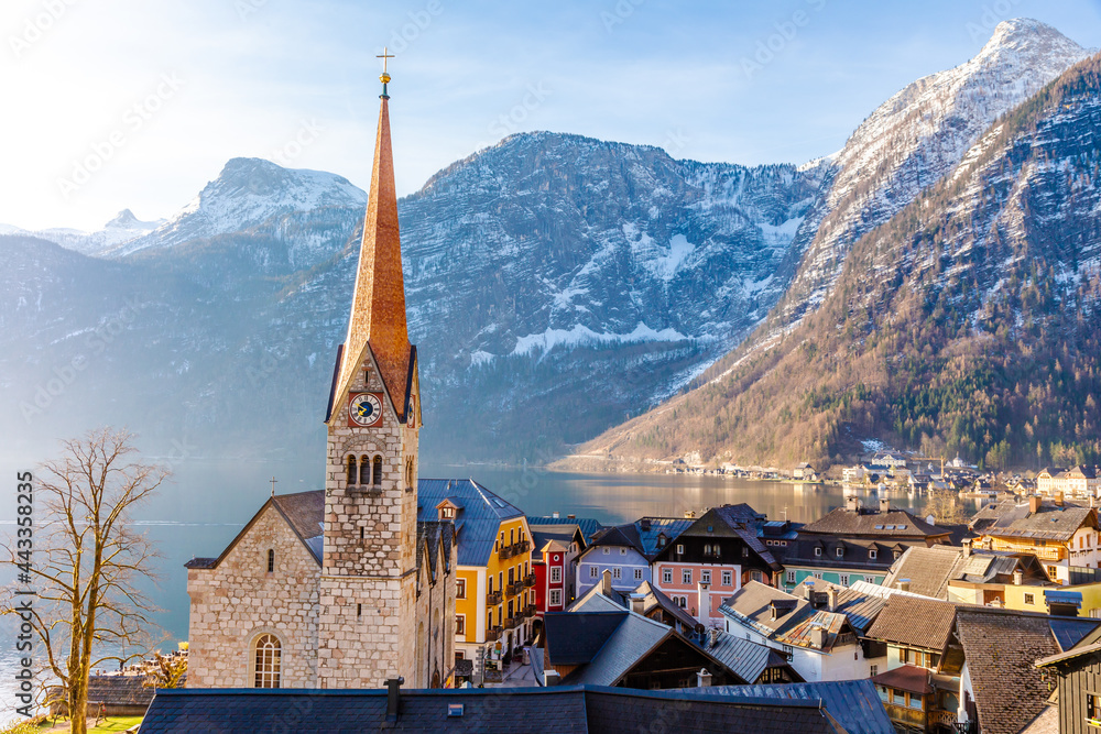 VIew of beautiful Hallstatt  famous church during morning sunrise in early spring