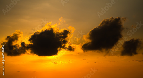 wonderful sky night dusk. black cloud with gold sunset twilight nature outdoor landscape. for new beginning  broken heart or celebrate holidays or happy new year 2022 background concept.