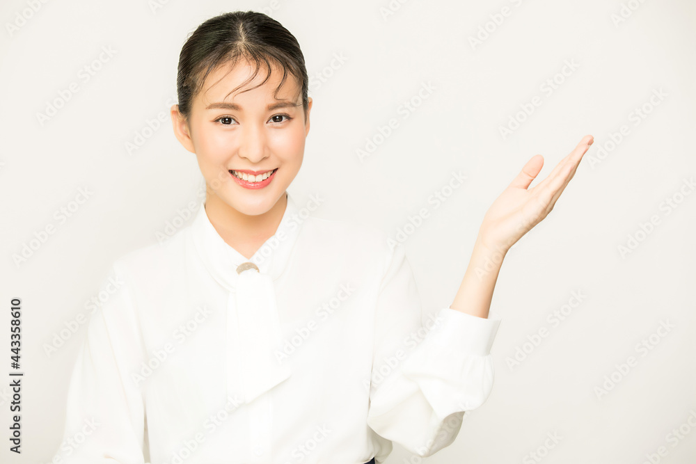 Portrait of pretty female office worker, business woman person showing something with business file material in isolate empty background Portrait of pretty female office worker, business woman person showing something with business file material in isolate empty background