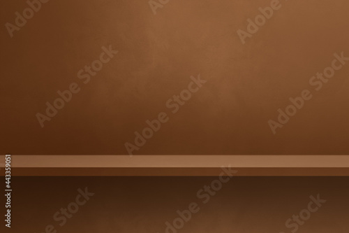 Empty shelf on a brown wall. Background template. Horizontal backdrop