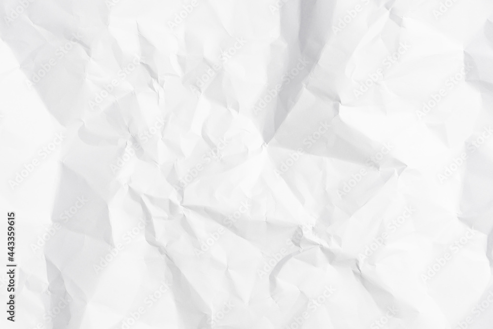 Obraz premium White crumpled paper texture background.