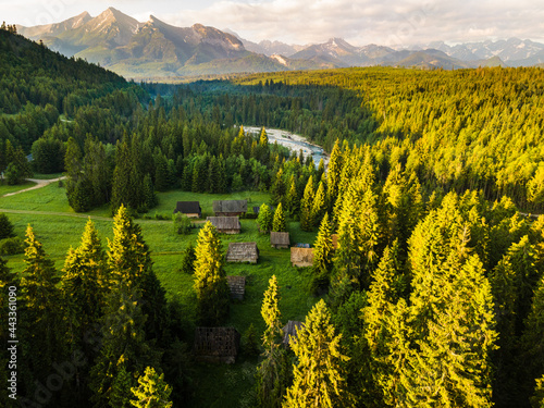 Fototapeta Naklejka Na Ścianę i Meble -  Traditional Wooden Log Cabins at Old Shepherd Hut Village in Jurgow, Podhale in Poland