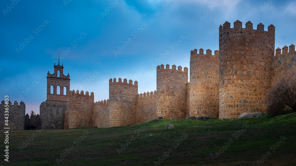 Medieval city wall built in the Romanesque style, Avila in Spain