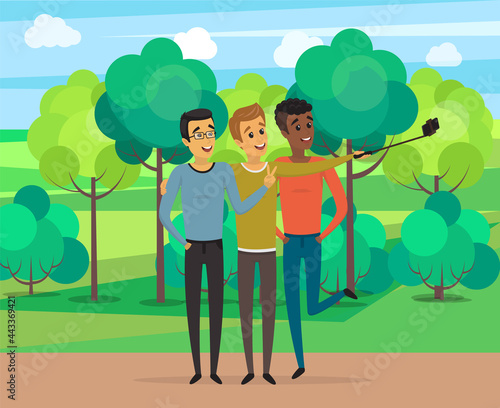 Group of male friends taking selfie photo with smartphone. Young people having fun and making selfie. Friendship and technology concept. Men with phone on monopod are posing for joint photo
