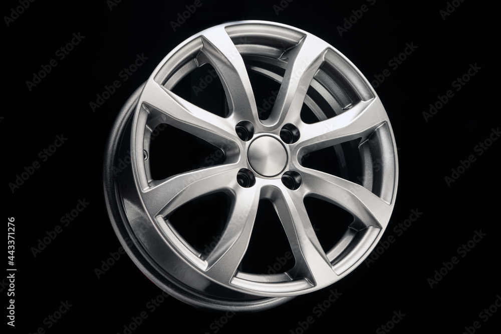 Obraz premium alloy wheel close up silver metallic color on black background