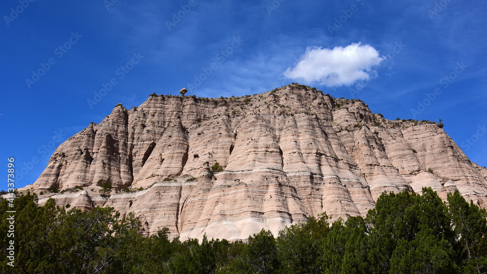 the bizarrely eroded  volcanic ash rock formations of kasha-katuwe tent rocks national monument on a sunny day , near santa fe, new mexico