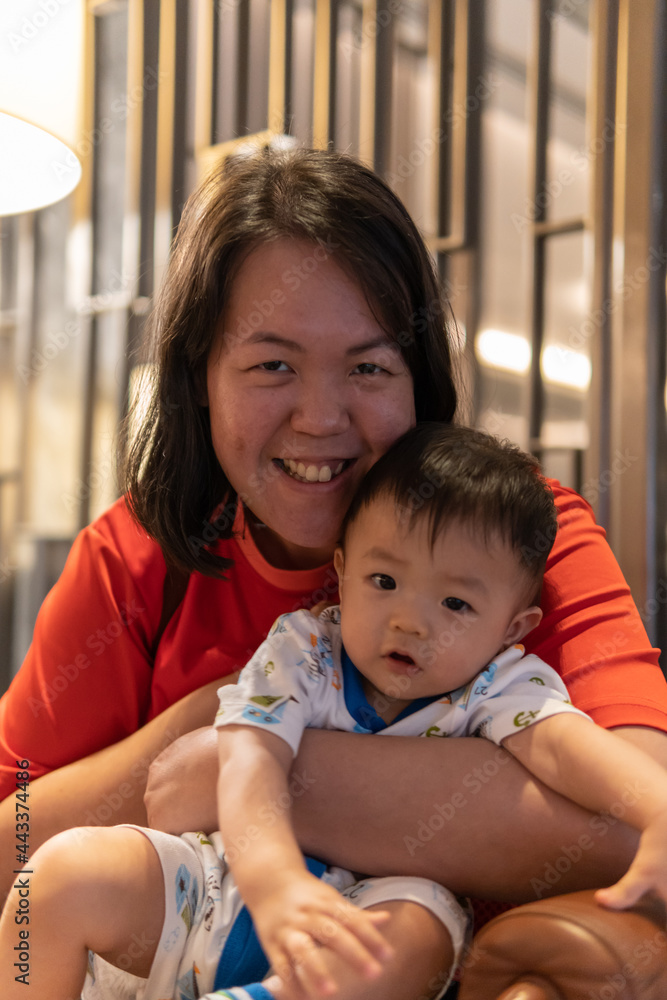 custom made wallpaper toronto digitalPortrait image of Cute and adorable Asian Chinese baby boy carry up by mother