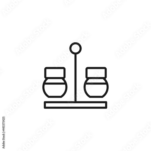 Salt and pepper on table