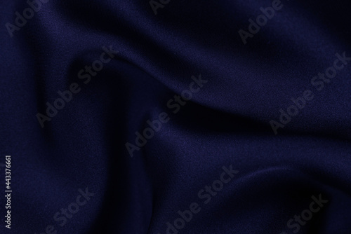 Smooth elegant silk or satin luxury cloth texture can use as wedding background. Luxurious background design.