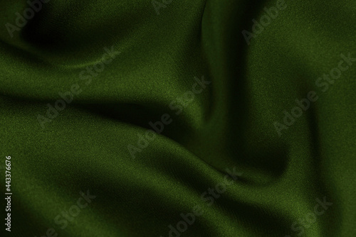 Smooth elegant silk or satin texture can use as abstract background. Luxurious background design