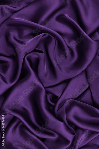 Abstract Satin Silky Cloth,Fabric Textile Drape with Crease Wavy Folds.with soft waves,waving in the wind.Texture of crumpled paper