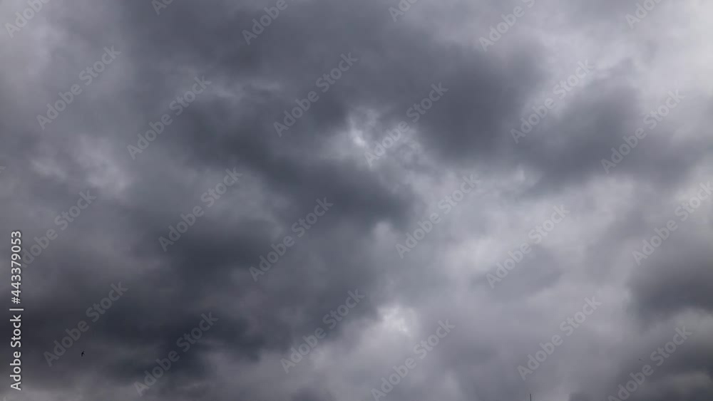 Time-lapse video in stormy summer weather with overcast sky. Gray clouds pass quickly, indication of bad weather. Time-lapse video in stormy summer weather with overcast sky. Gray clouds pass quickly, indication of bad weather.