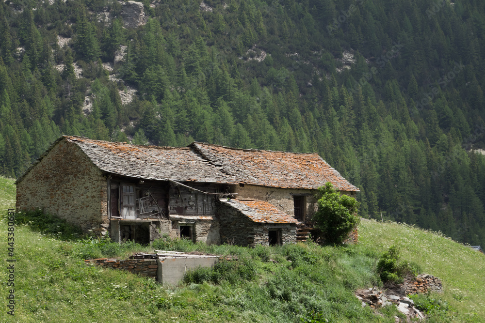 Traditional Swiss farmhouse built of natural stone
