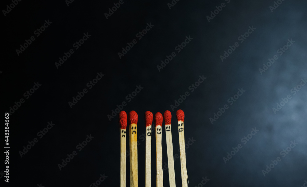 Group of a red match burning isolated with the background. Row burning matchstick in the chain reaction. Matchstick art photography. Group of a red match burning isolated with the background. Row burning matchstick in the chain reaction. Matchstick art photography.