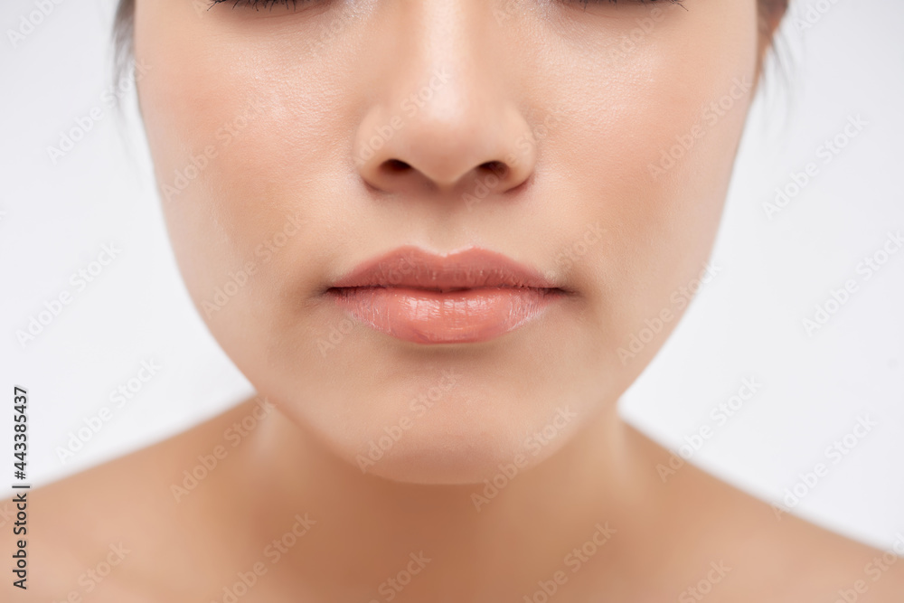 Obraz premium Close-up image of young un woman with beautiful flawless skin