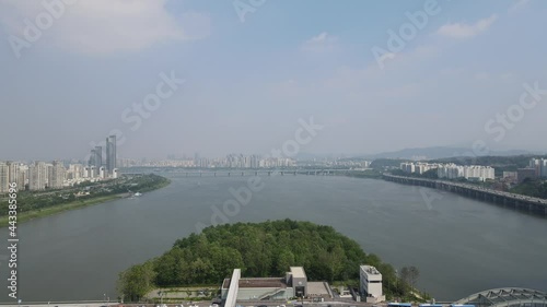 Aerial shot flying over the Han River and Nodeul Island in Seoul city photo