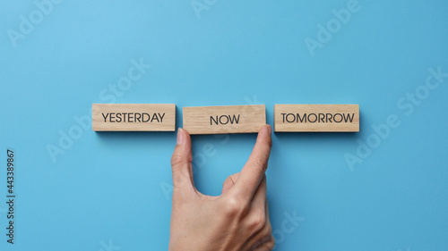 Obraz na plátne Wooden cubes with inscriptions: yesterday, tomorrow, now