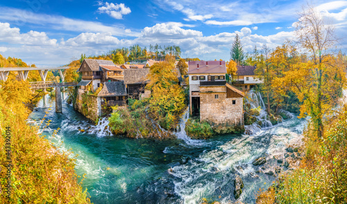 Landscape with river and little waterfall in Rastoke village, Croatia photo