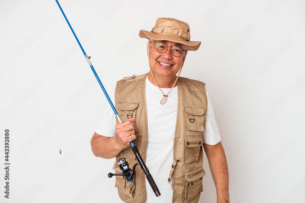 Senior american fisherman holding rod isolated on white background happy, smiling and cheerful. Senior american fisherman holding rod isolated on white background happy, smiling and cheerful.