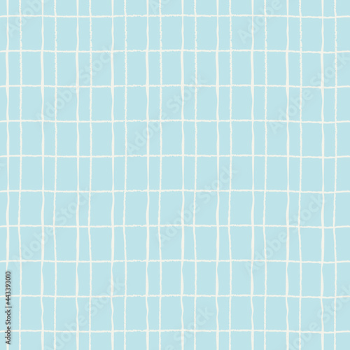 Seamless plaid repeating pattern with hand drawn grid. Blue background for wrapping paper, textile, surface design and other design projects