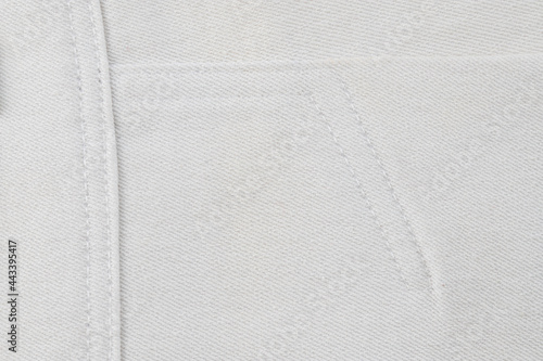 a fragment of a sewing product, clothing made of natural linen and cotton, a double seam, the connection of parts with machine stitching