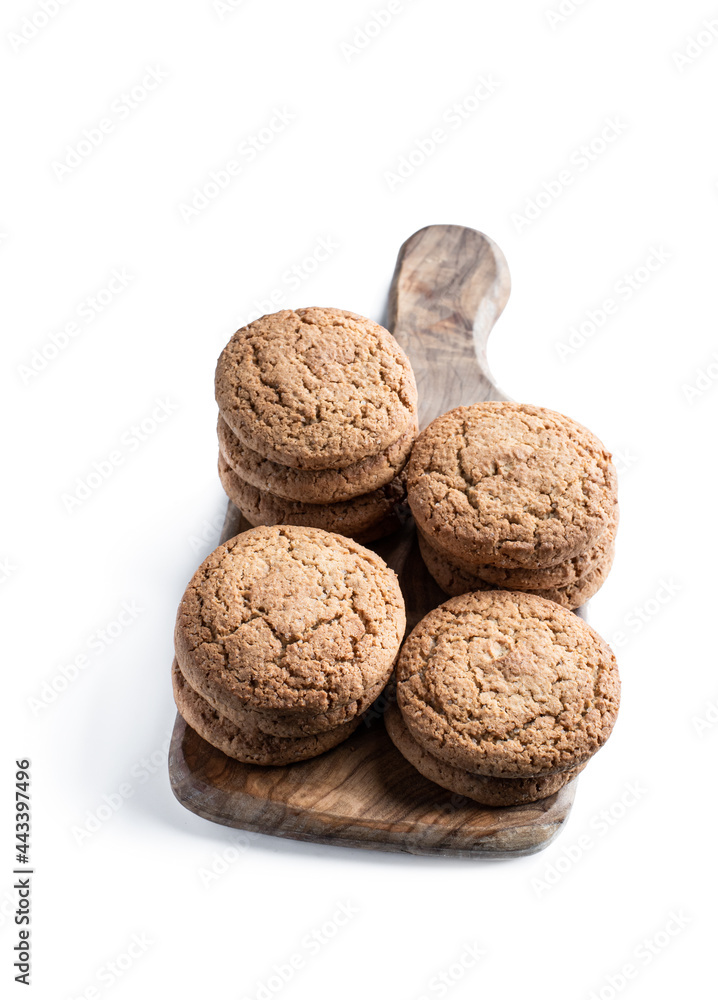 Oatmeal cookies on serving board isolated on white background Oatmeal cookies on serving board isolated on white background