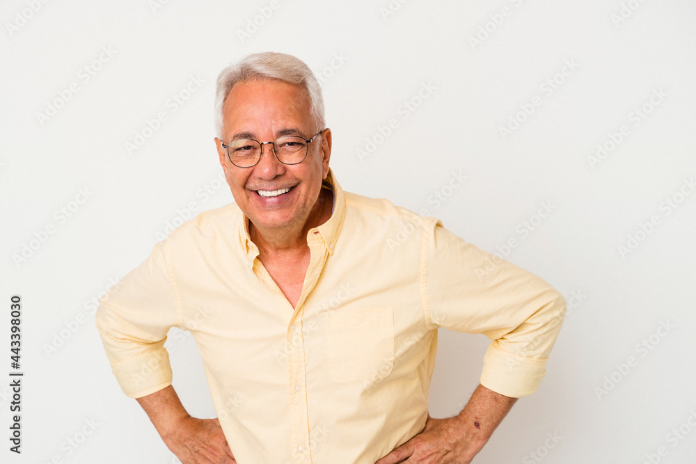 Senior american man isolated on white background happy, smiling and cheerful. Senior american man isolated on white background happy, smiling and cheerful.