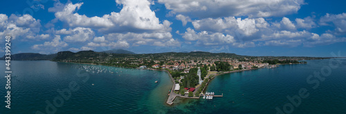 Bardolino, coastline aerial view panorama. Historic town of Bardolino on Lake Garda, Italy. Coastline on Lake Garda top view.