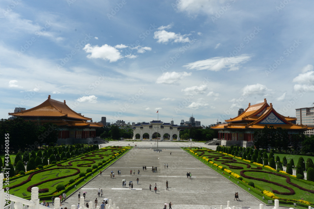Chiang Kai Shek Memorial Hal in Taipei, Taiwan. The beautiful white building have an octogonal blue roof because number 8 is considered lucky in chinese culture.