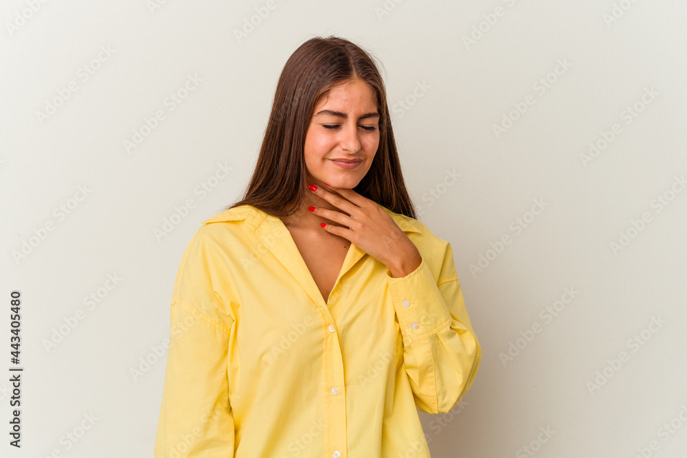 Young caucasian woman isolated on white background who feels confident, crossing arms with determination. Young caucasian woman isolated on white background who feels confident, crossing arms with determination.