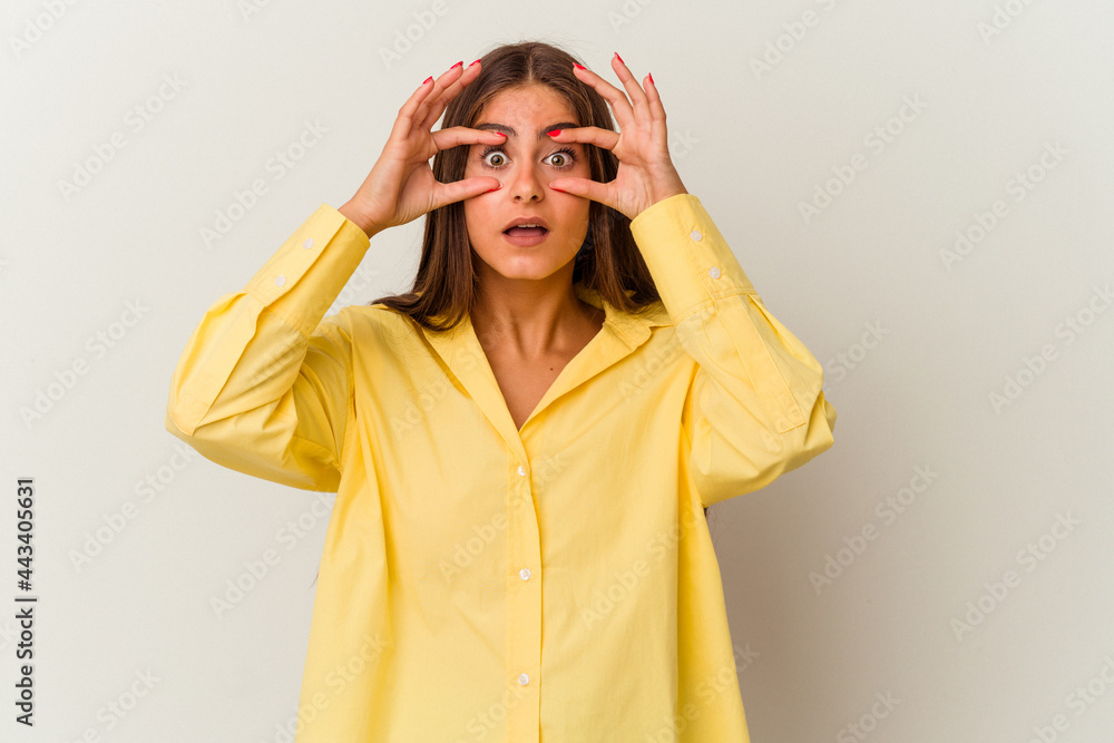 Young caucasian woman isolated on white background unhappy looking in camera with sarcastic expression. Young caucasian woman isolated on white background unhappy looking in camera with sarcastic expression.