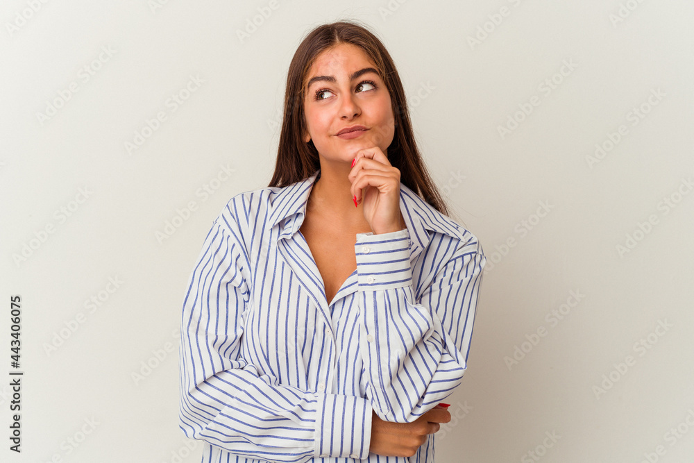 Young caucasian woman isolated on white background shocked and amazed holding a copy space between hands. Young caucasian woman isolated on white background shocked and amazed holding a copy space between hands.