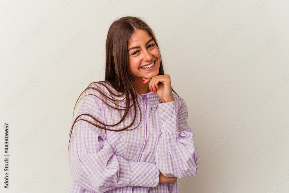 Young caucasian woman isolated on white background showing strength gesture with arms, symbol of feminine power Young caucasian woman isolated on white background showing strength gesture with arms, symbol of feminine power