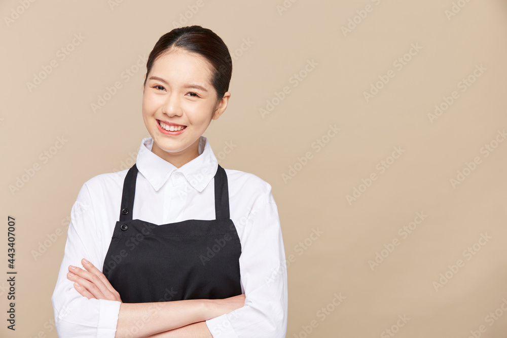 Portrait of asian waitress beaufitul female is posing in the studio with happy smiling at isolate blank empty background studio Portrait of asian waitress beaufitul female is posing in the studio with happy smiling at isolate blank empty background studio