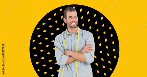Composition of male fashion designer smiling on yellow background