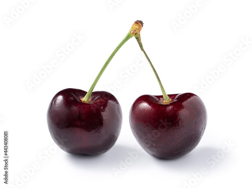 Beautiful and delicious cherry fruit isolated on white table background.