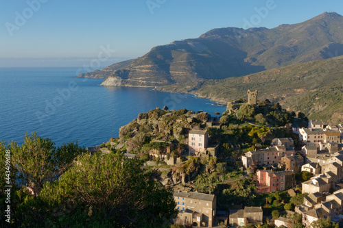 View of the village of Nonza with its Genoese tower, Cap Corse in Corsica, France