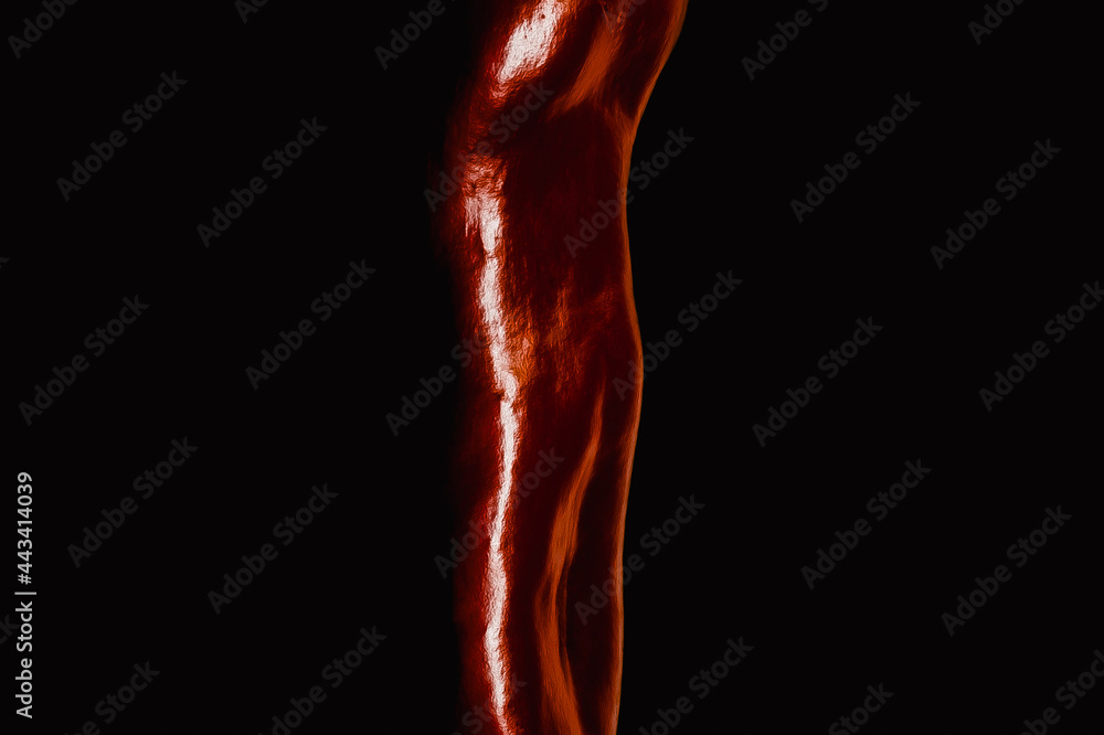 Human body shaped sweet red kapia pepper on black background Human body shaped sweet red kapia pepper on black background